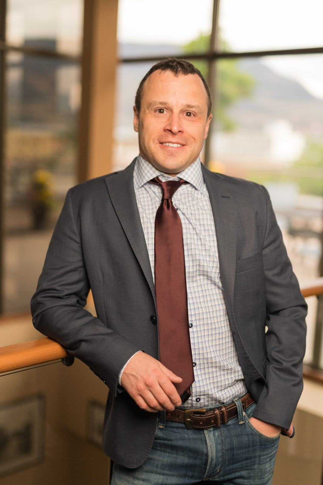Pushor Mitchell LLP corporate story frame 6: Corporate portraits for Pushor Mitchell LLP in Kelowna, with polished office headshots, approachable legal-team profile images and business photography for a professional law firm..