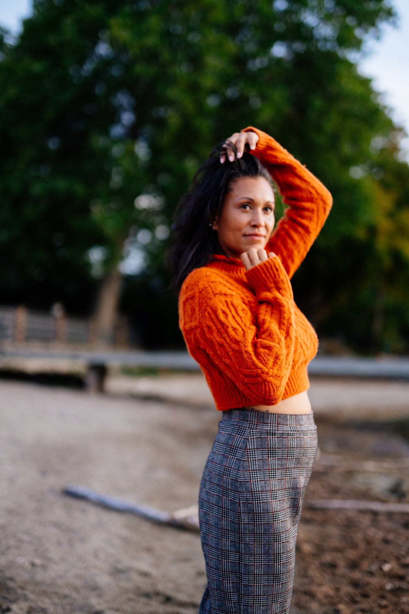 Rebekah in Autumn: Framed arm gesture by the beach trees.