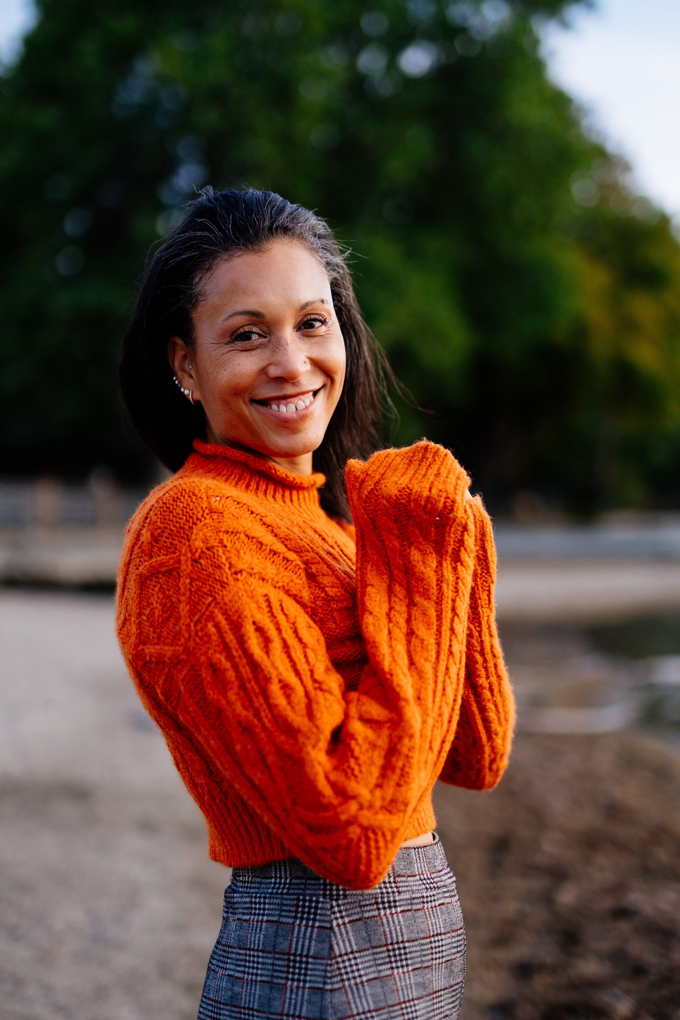 Rebekah in Autumn: Soft smiling shoulder turn.