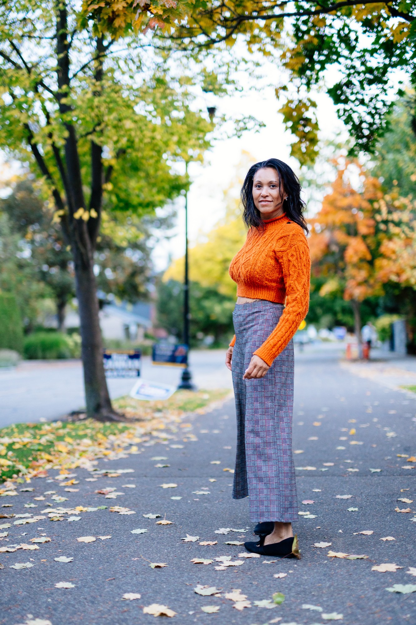Rebekah in Autumn: Full figure turning back under autumn trees.