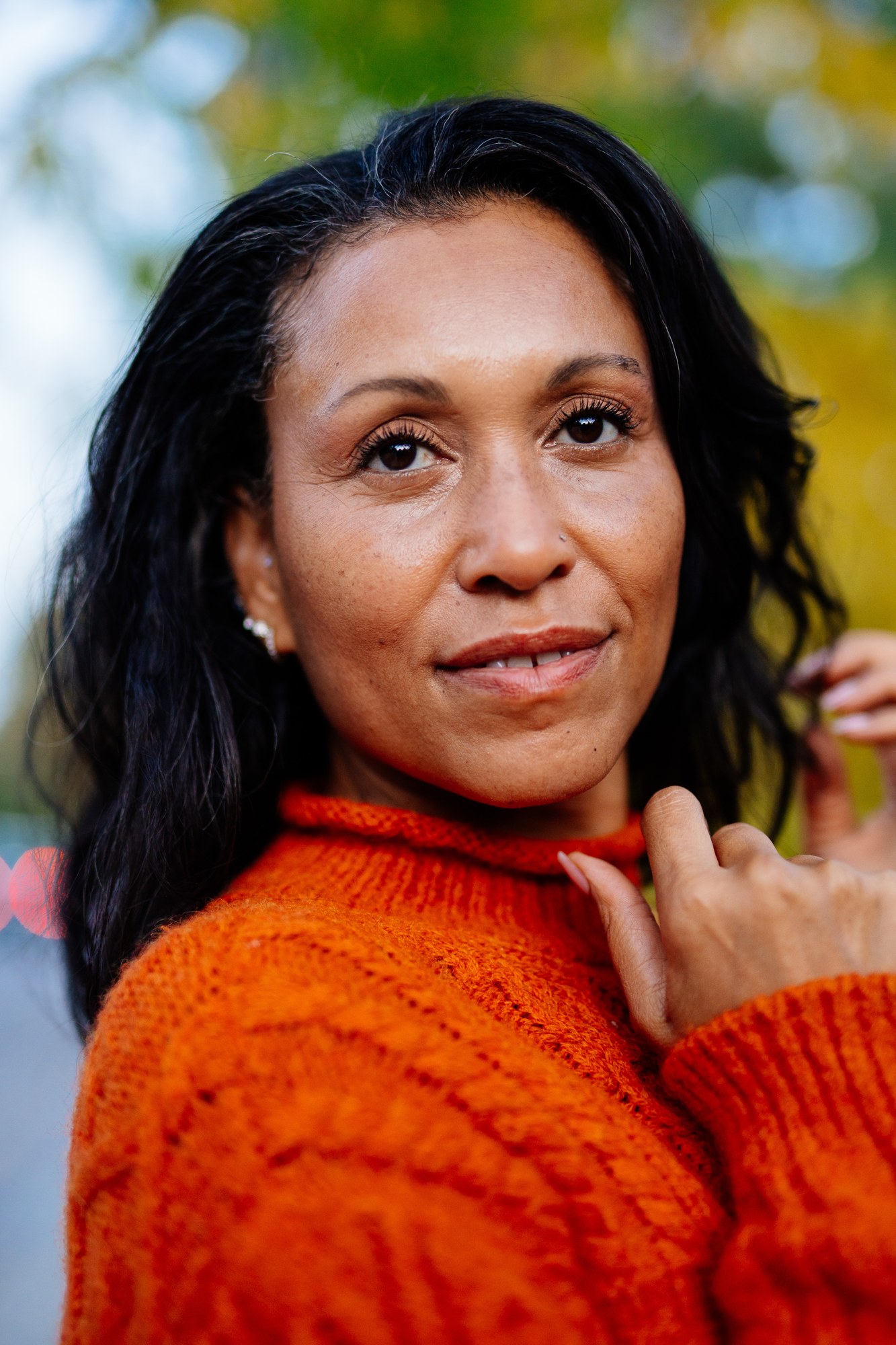 Rebekah in Autumn: Close upward gaze with face detail.