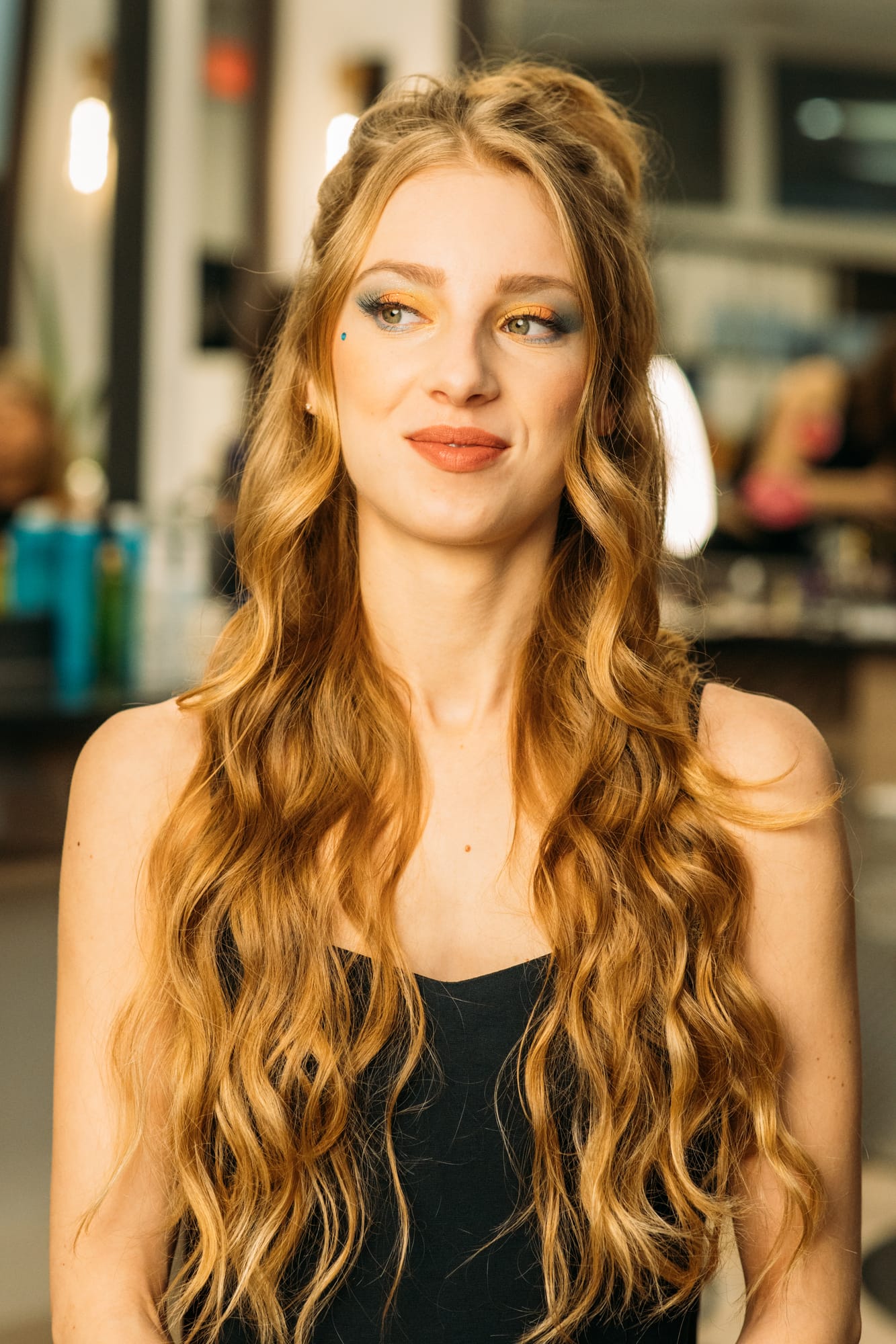Sass Hair and Diva Den corporate story frame 10: Special-event, prom and grad beauty portraits for Sass Hair and Diva Den in Kelowna, with finished hair, makeup, salon atmosphere and polished vendor images..