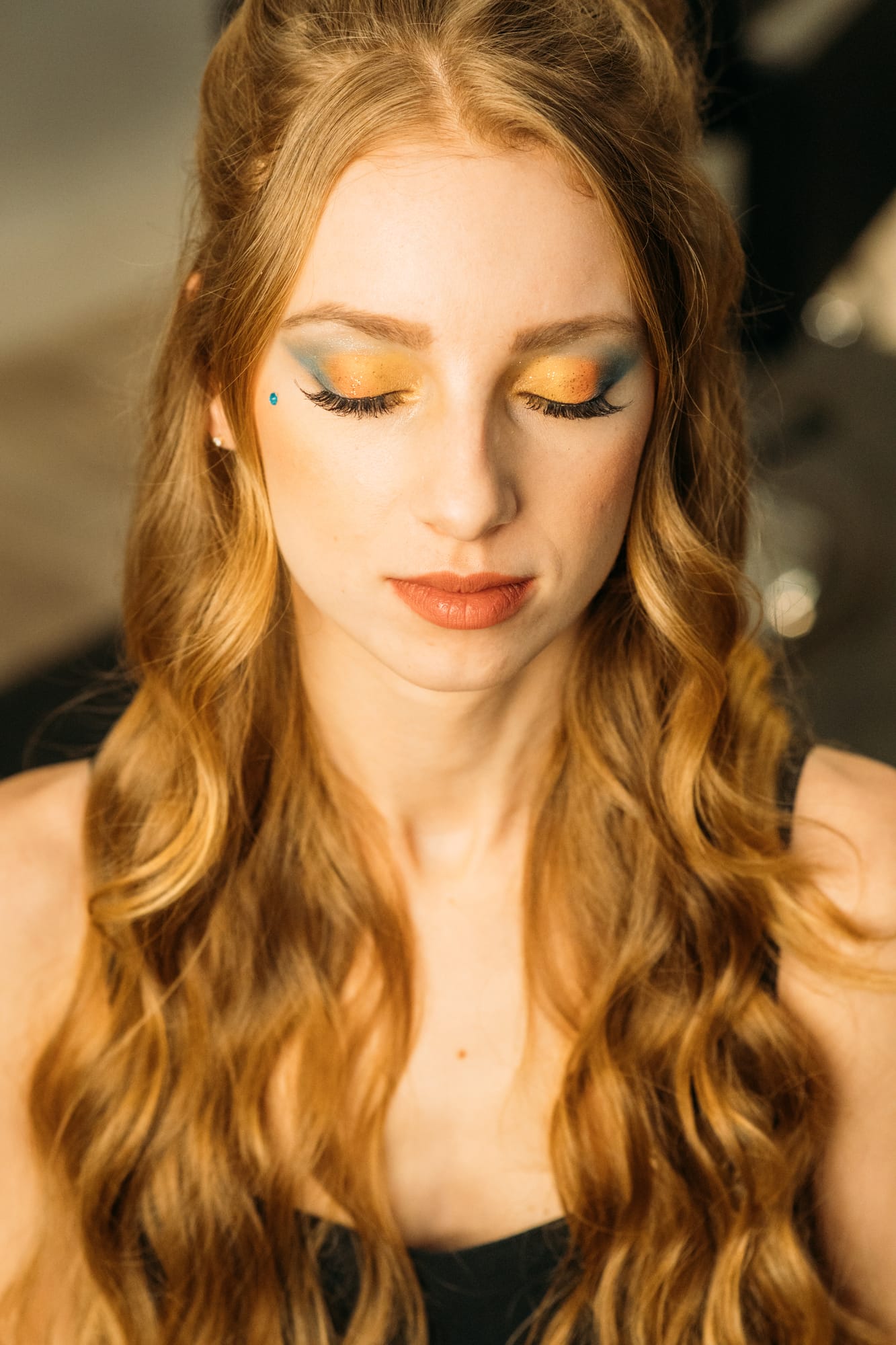 Sass Hair and Diva Den corporate story frame 14: Special-event, prom and grad beauty portraits for Sass Hair and Diva Den in Kelowna, with finished hair, makeup, salon atmosphere and polished vendor images..