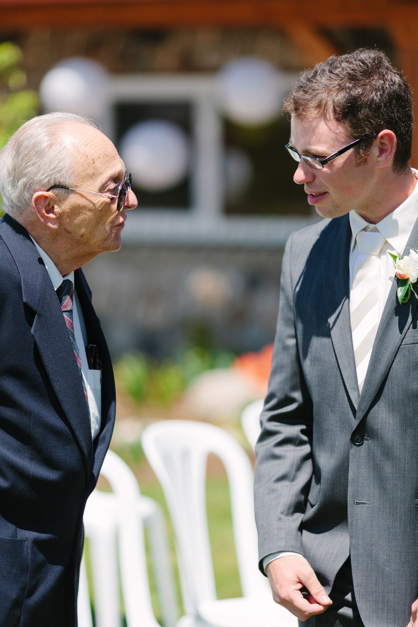 Shannon & Ehren: A warm greeting with an older guest before the ceremony.
