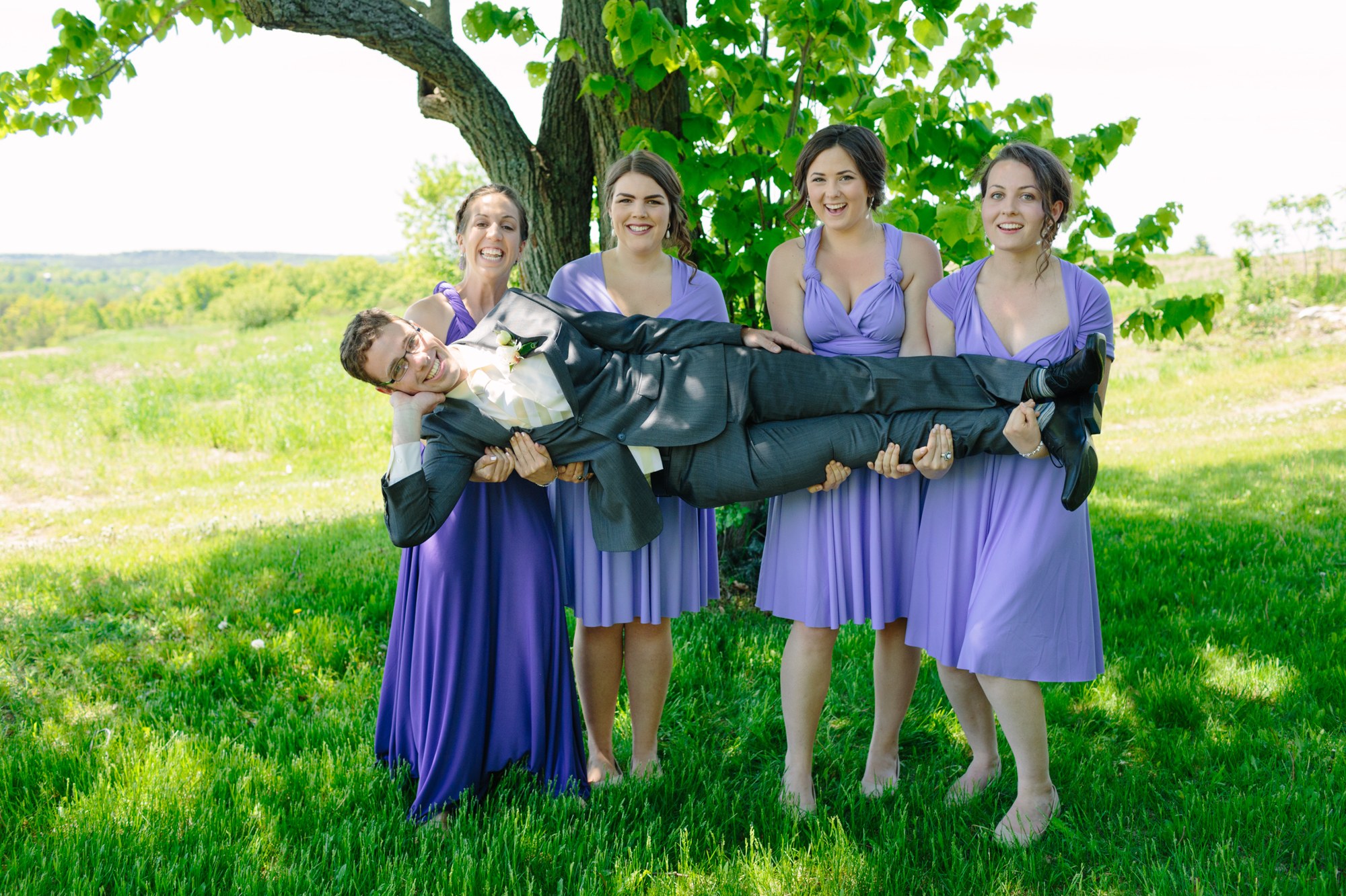 Shannon & Ehren: A playful lifting portrait with the bridesmaids.
