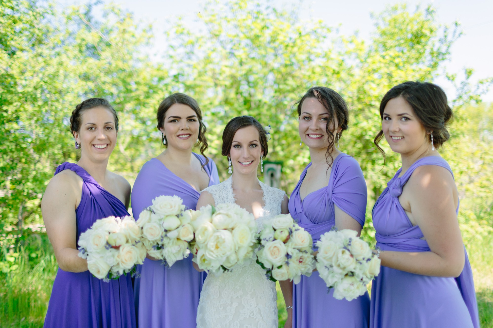 Shannon & Ehren: The bride and bridesmaids with their bouquets.