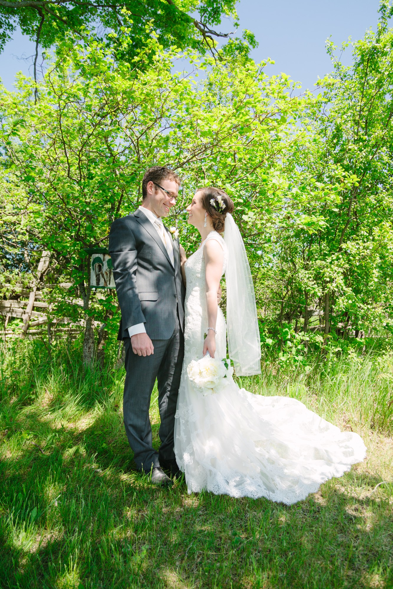 Shannon & Ehren: Full couple portrait beneath the trees.