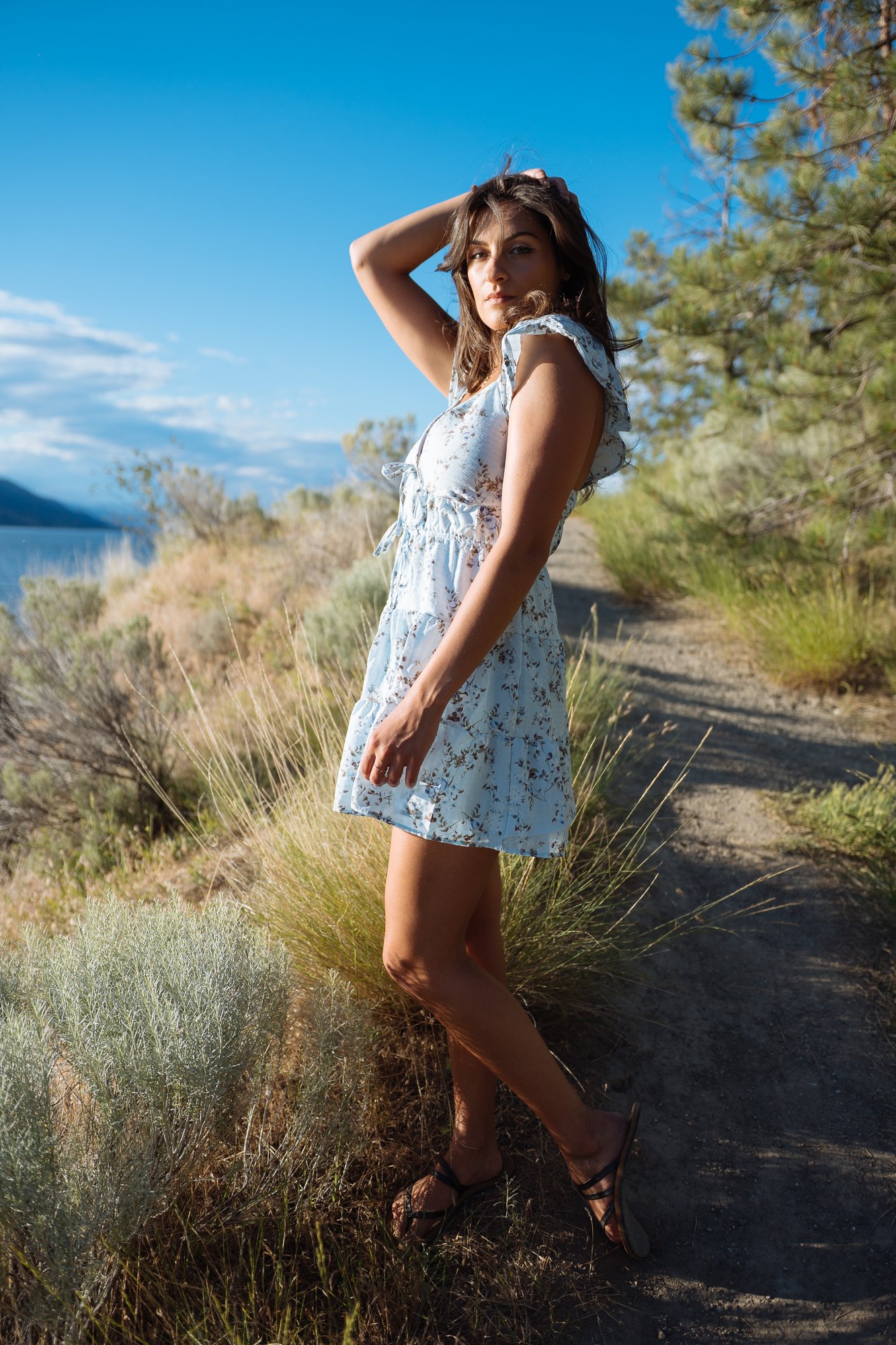 Shatille — standing beside a tree above the lake