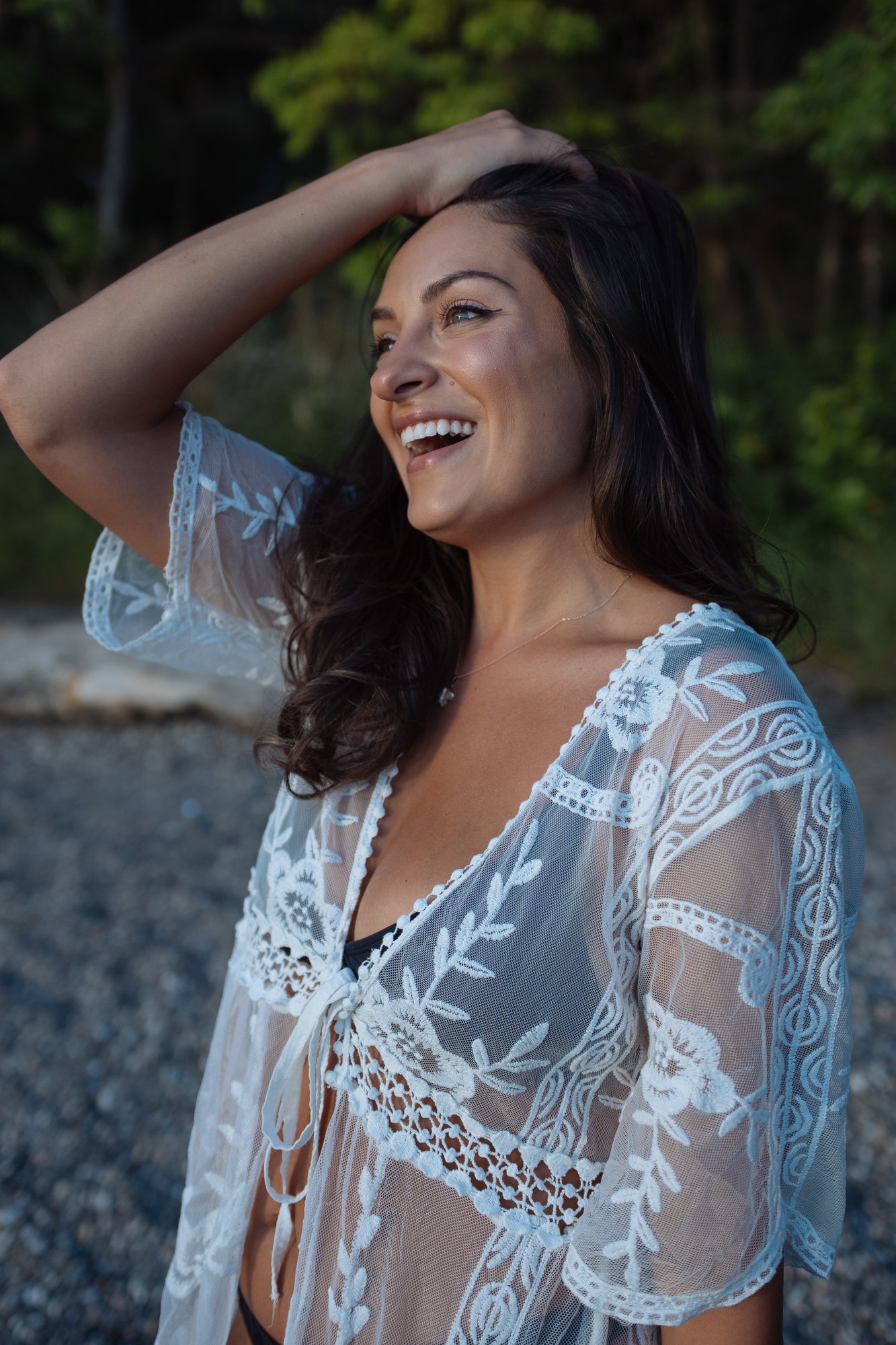 Shatille — a candid laugh in the white lace cover-up