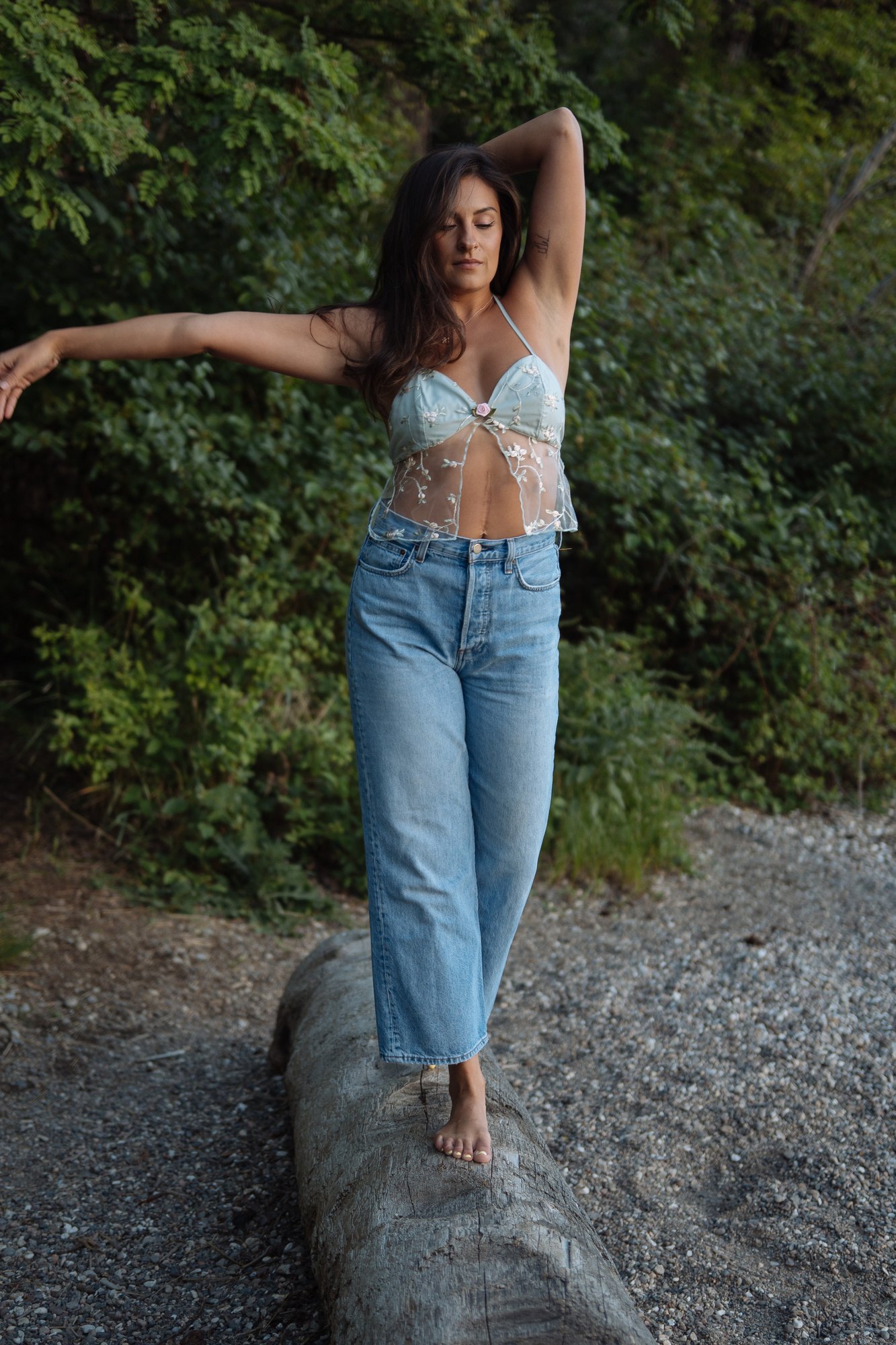 Shatille — walking with an arm extended above the beach