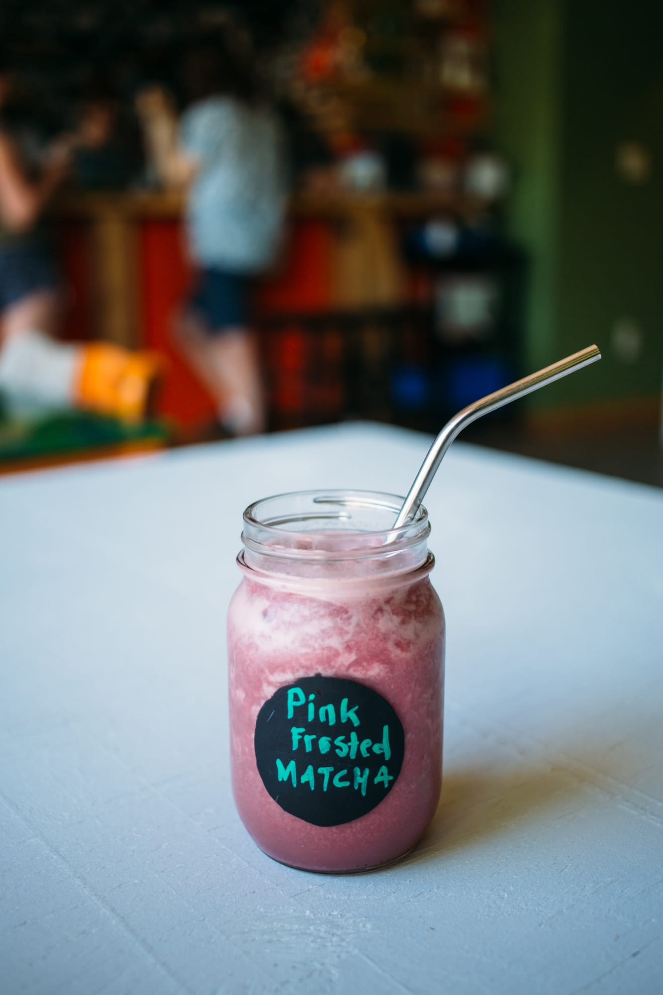 Smudge Noshery corporate story frame 30: Food and hospitality brand photography for Smudge Noshery in Salmon Arm, BC, with colourful flatlays, smoothies, bowls, cafe details and commercial product images for a local restaurant..