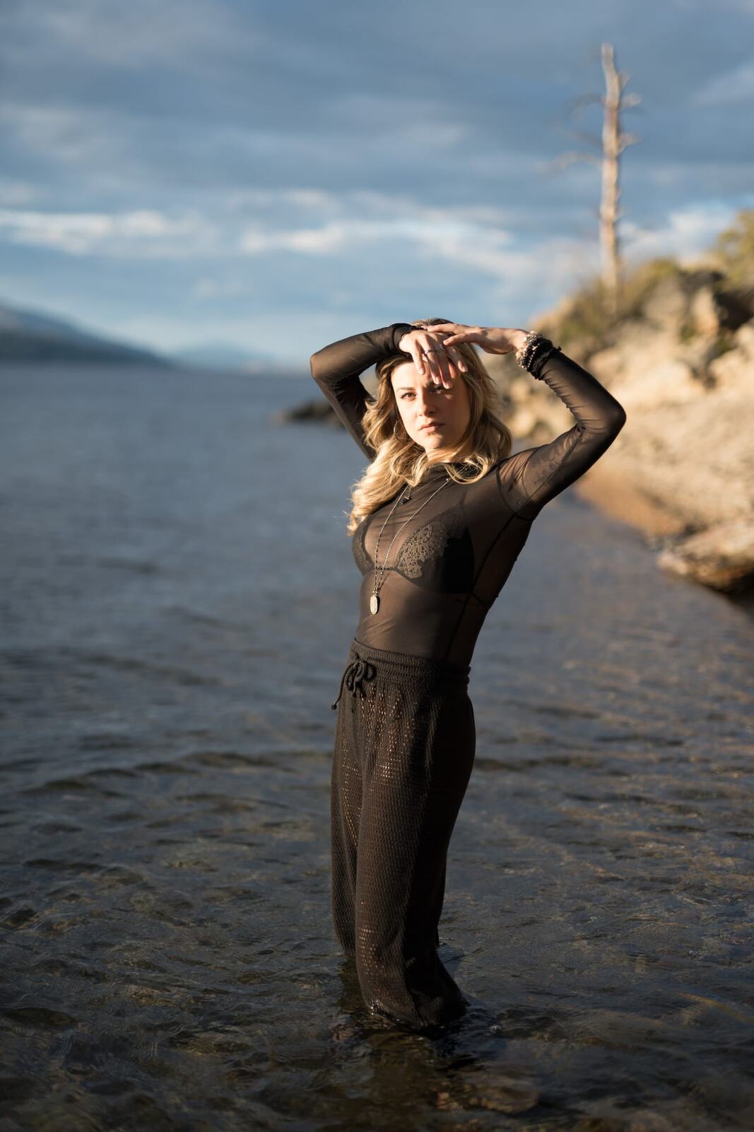 Sophia by the Water and Trees portraits story frame 6: Black outfits, water, trees, swimwear and a confident, sensual portrait story.