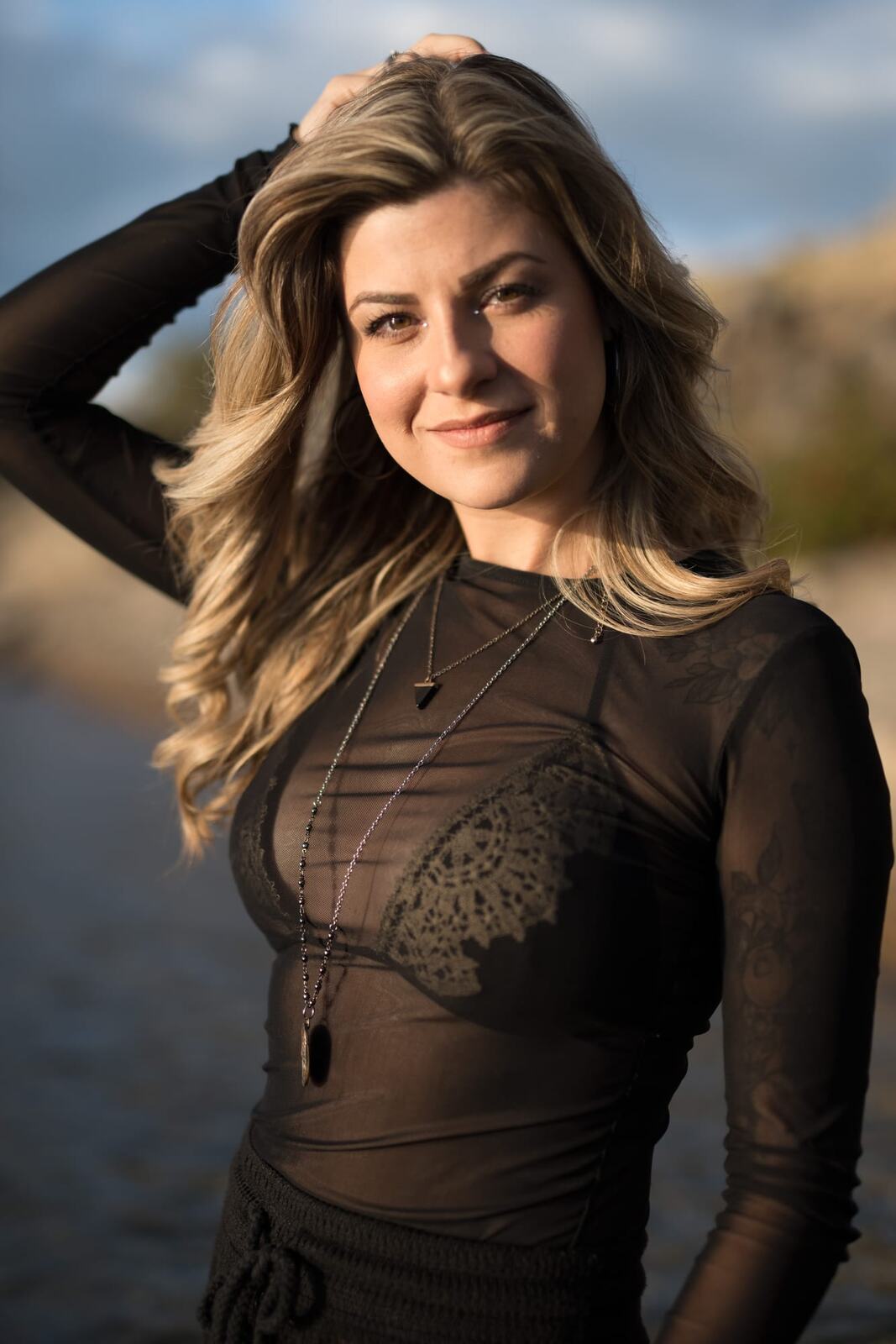 Sophia by the Water and Trees portraits story frame 7: Black outfits, water, trees, swimwear and a confident, sensual portrait story.