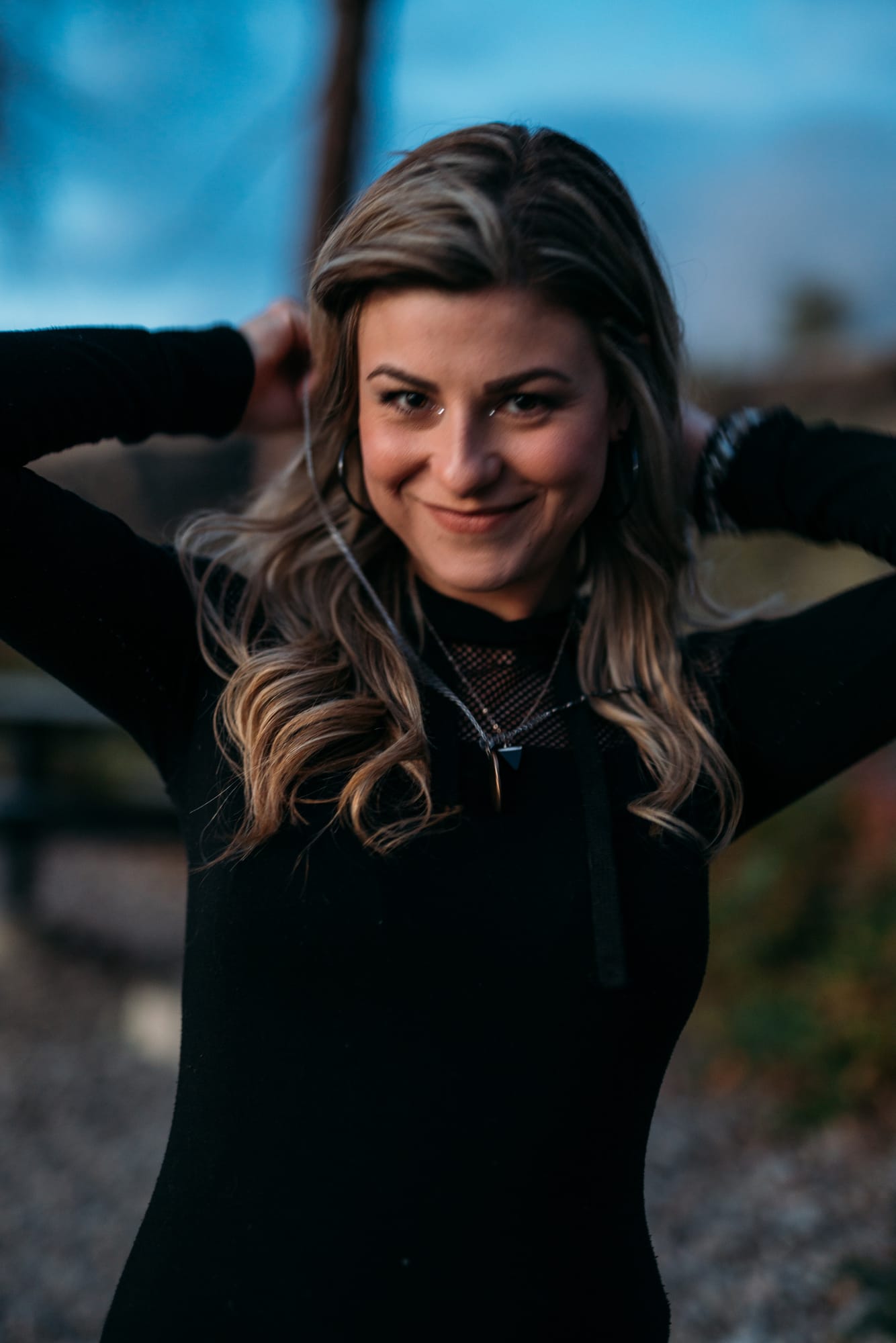 Sophia by the Water and Trees portraits story frame 18: Black outfits, water, trees, swimwear and a confident, sensual portrait story.