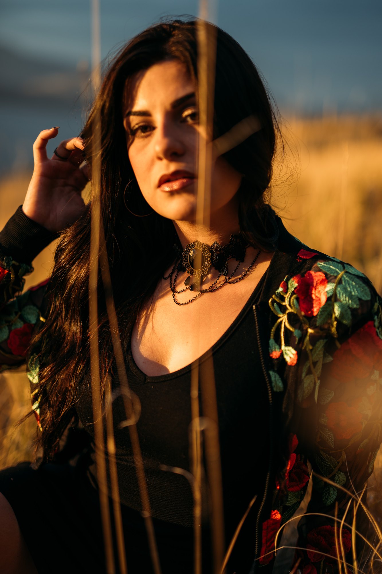 Sophia — close portrait among the sunlit grass