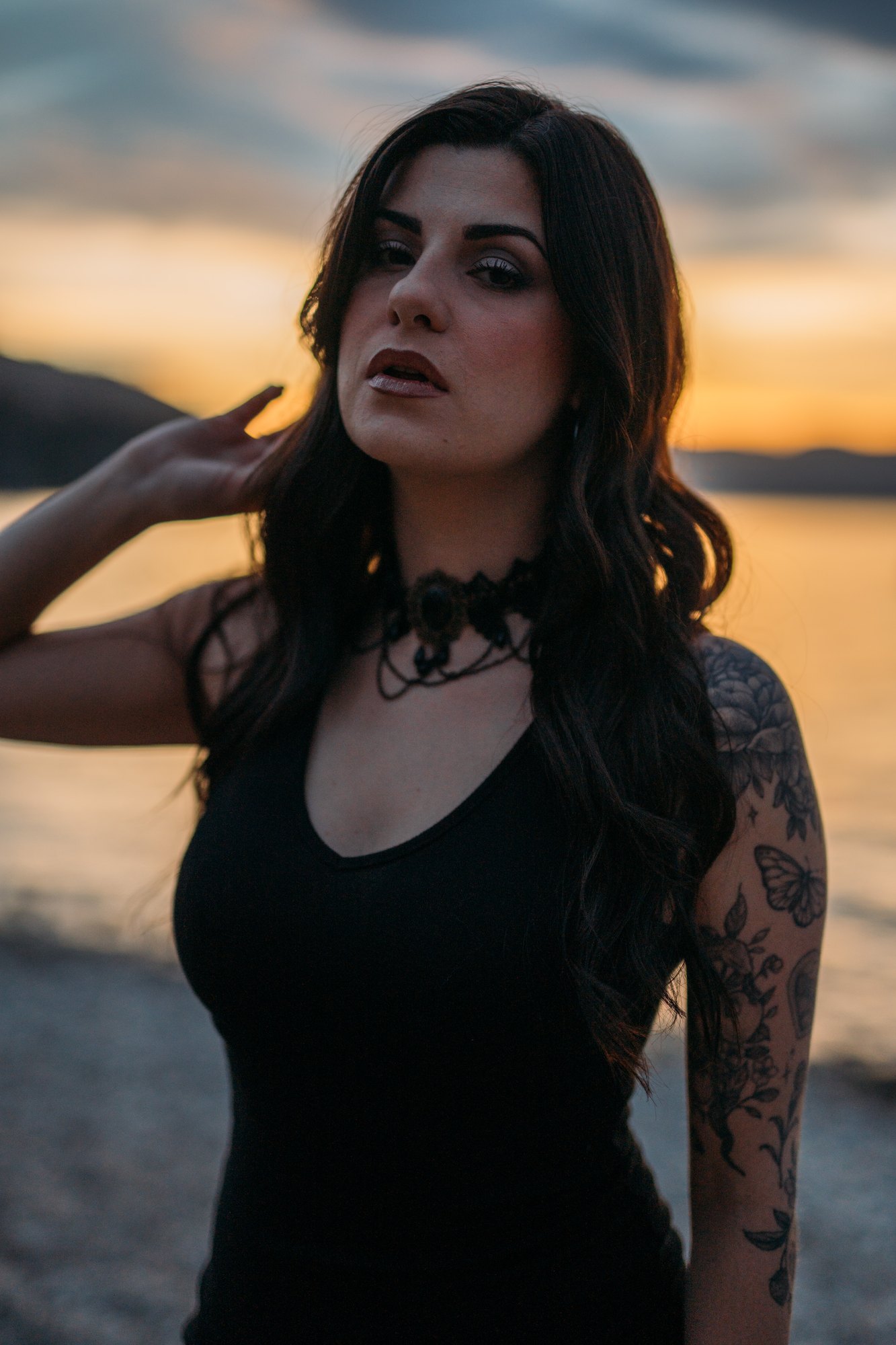 Sophia — quiet portrait against the sunset lake