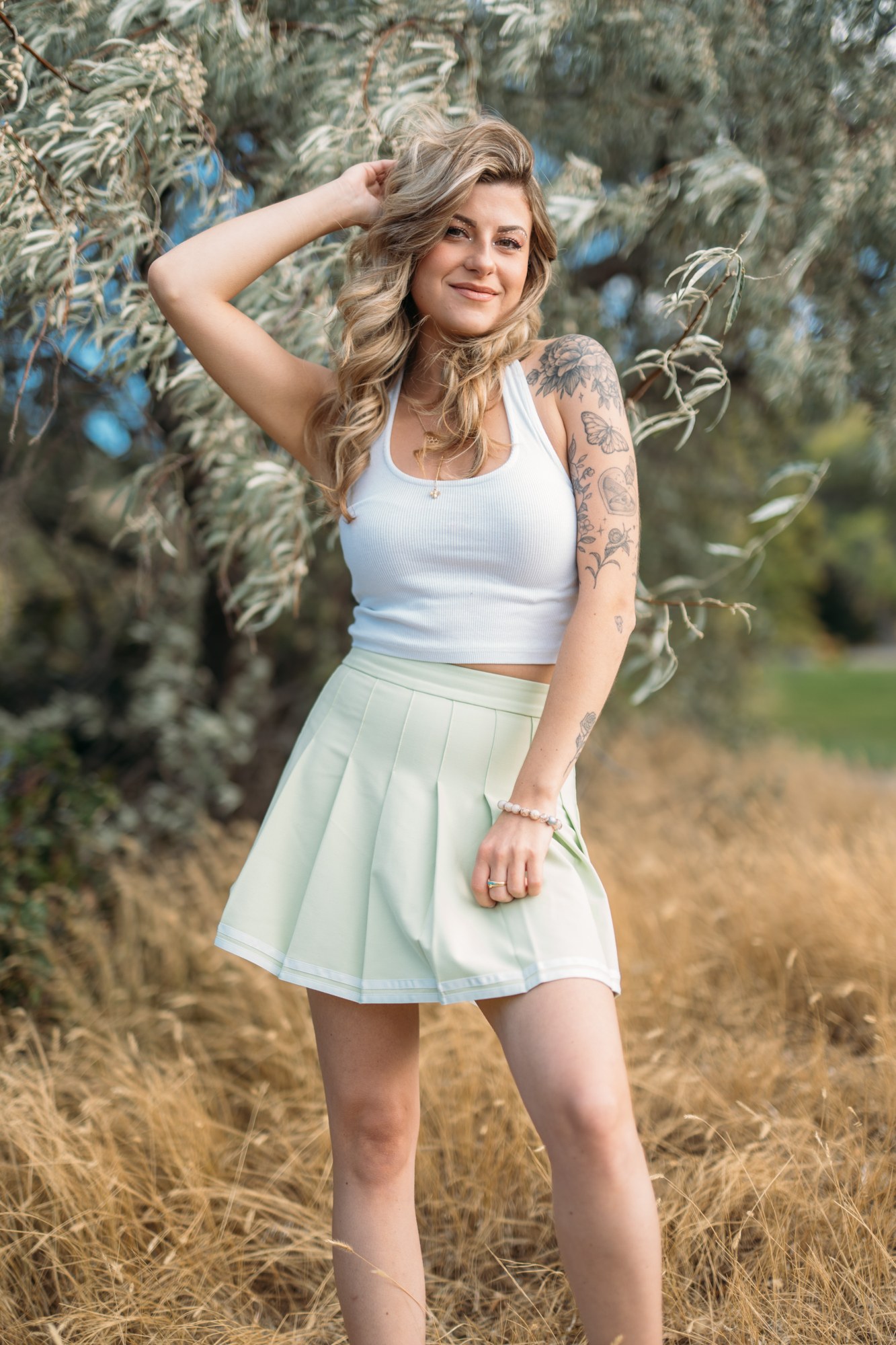 Sophia at Bertram Creek Park: Easy smile beside the willow.