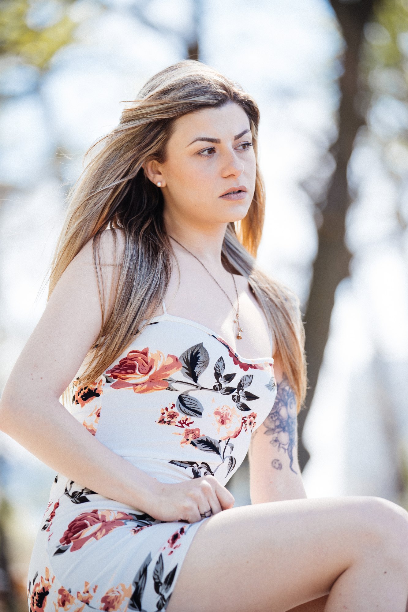 Sophia — looking across the park with wind in her hair