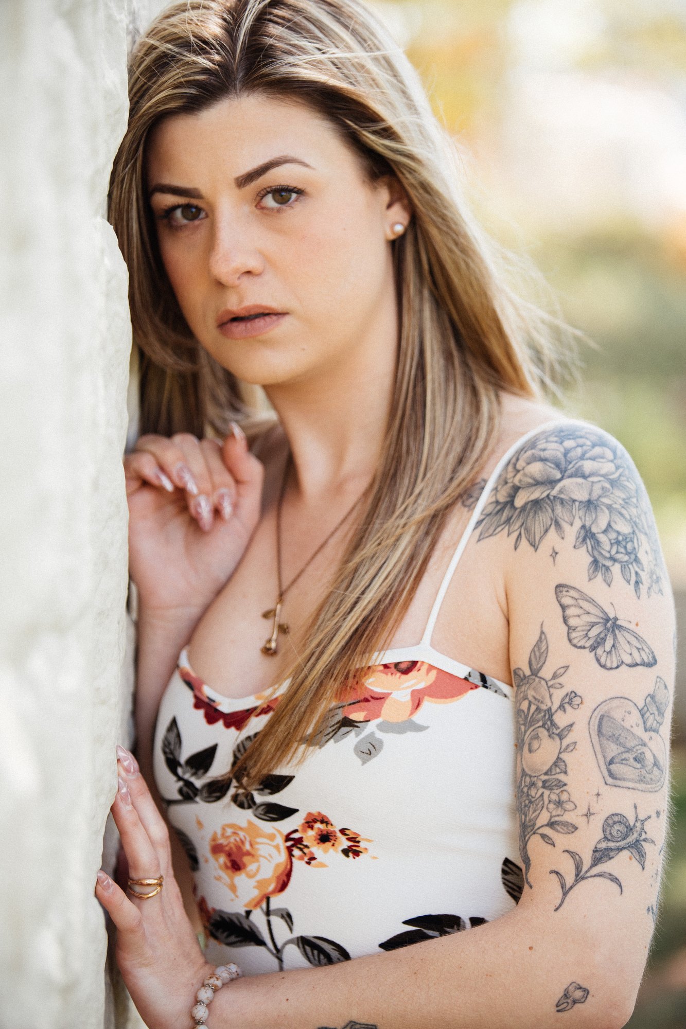 Sophia — quiet portrait with a hand beneath her chin