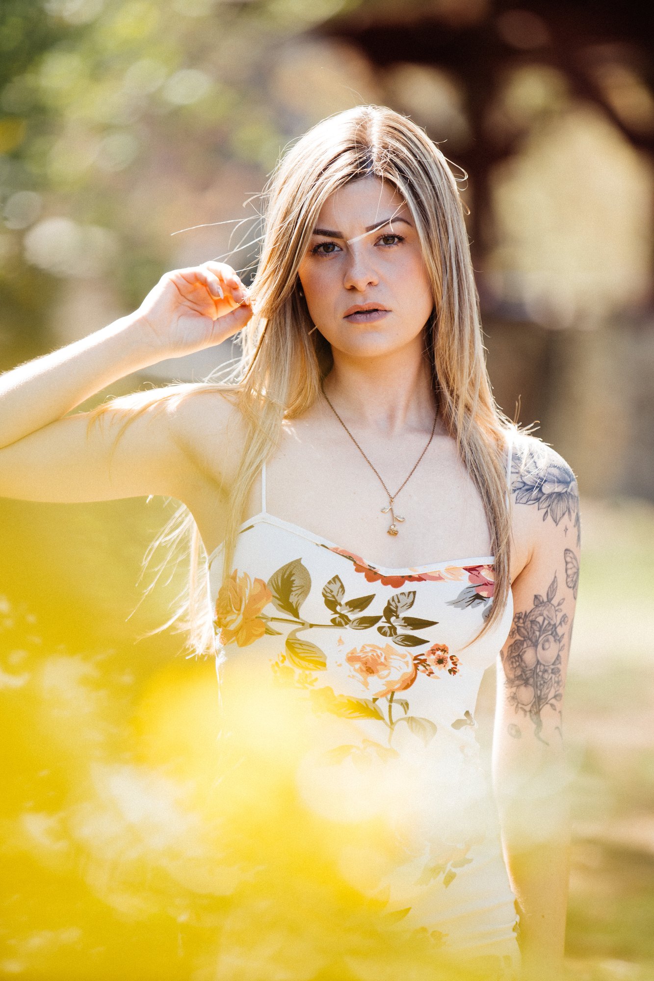 Sophia — portrait framed by yellow spring flowers