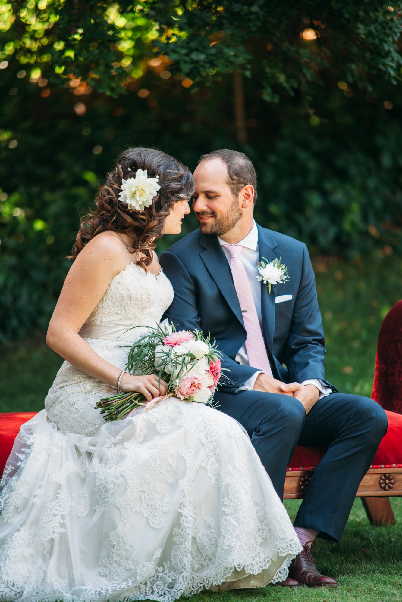 Steph & Taylor: A quiet affectionate seated portrait.
