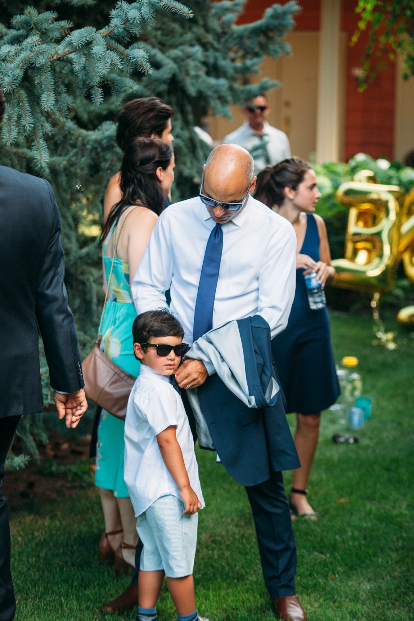 Steph & Taylor: An affectionate moment between a guest and child.