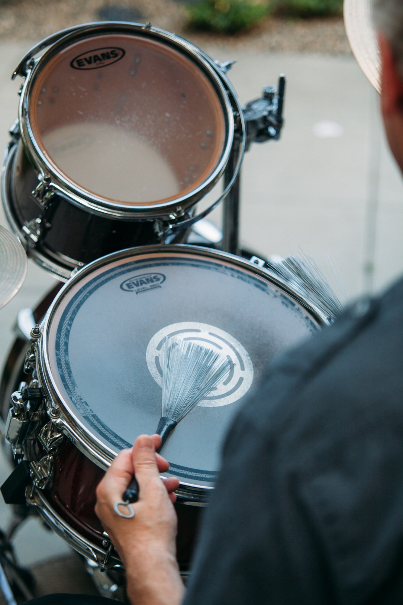 Steph & Taylor: Hands playing the drums.