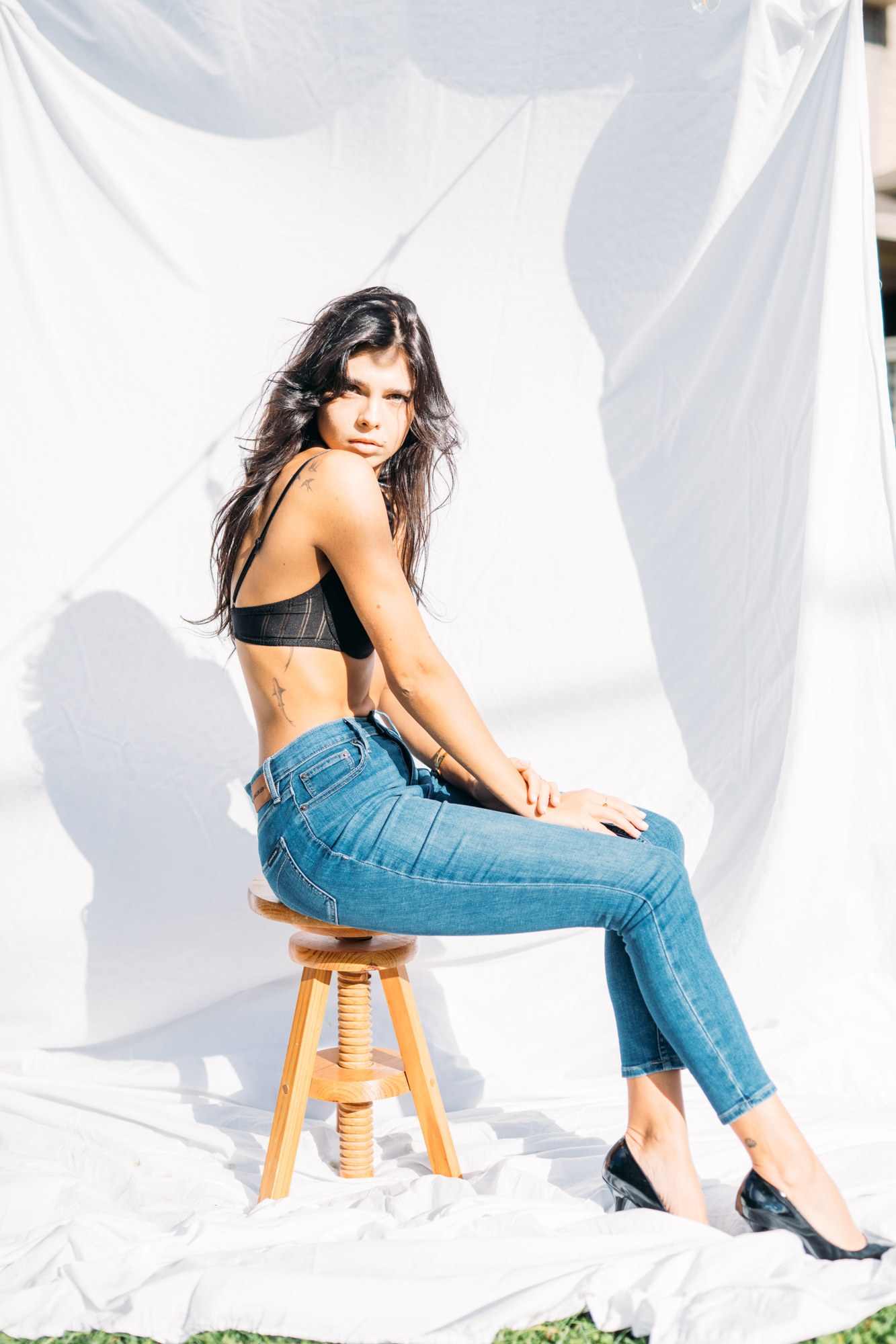 Sunny in Sunlight: Side-on seated figure.