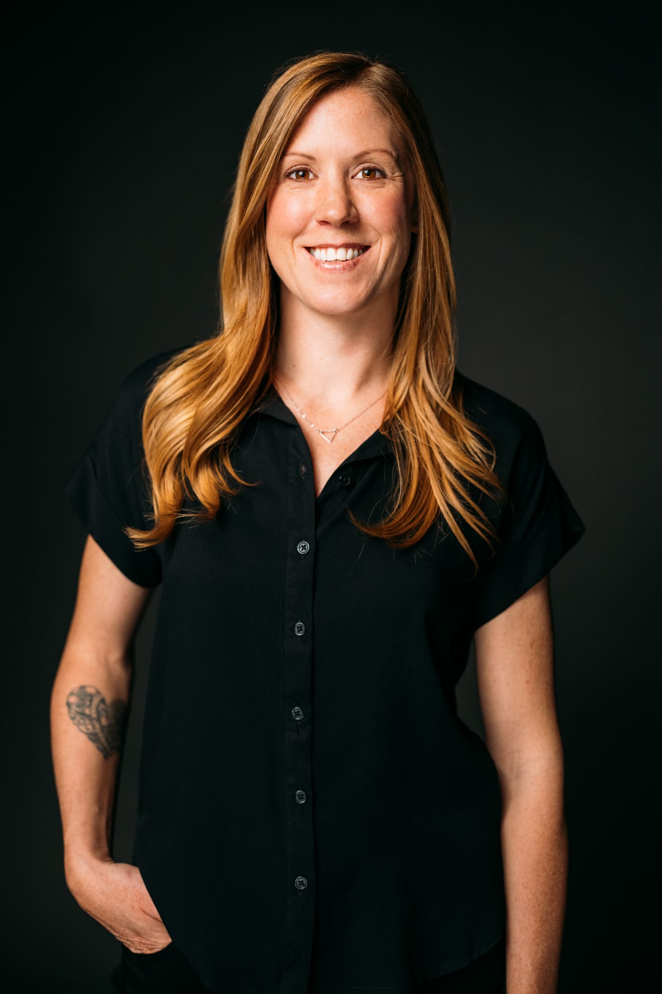Team Bennett corporate story frame 2: Real estate team portraits at Kelowna Film Studios, with individual headshots, group photos and clean marketing images for profiles, listings and business use..