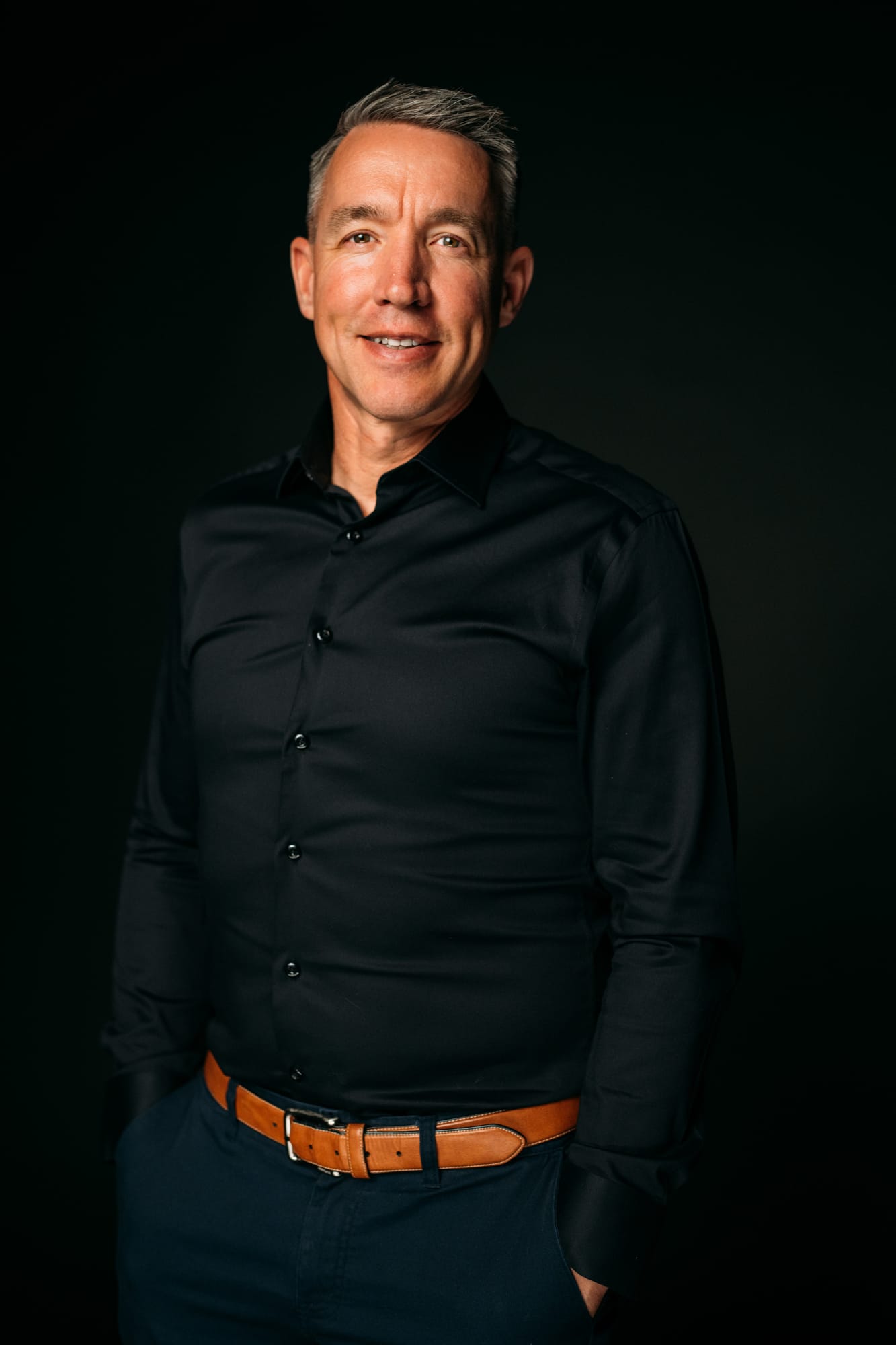 Team Bennett corporate story frame 7: Real estate team portraits at Kelowna Film Studios, with individual headshots, group photos and clean marketing images for profiles, listings and business use..