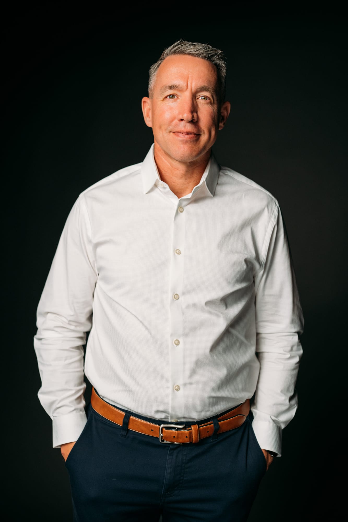 Team Bennett corporate story frame 8: Real estate team portraits at Kelowna Film Studios, with individual headshots, group photos and clean marketing images for profiles, listings and business use..