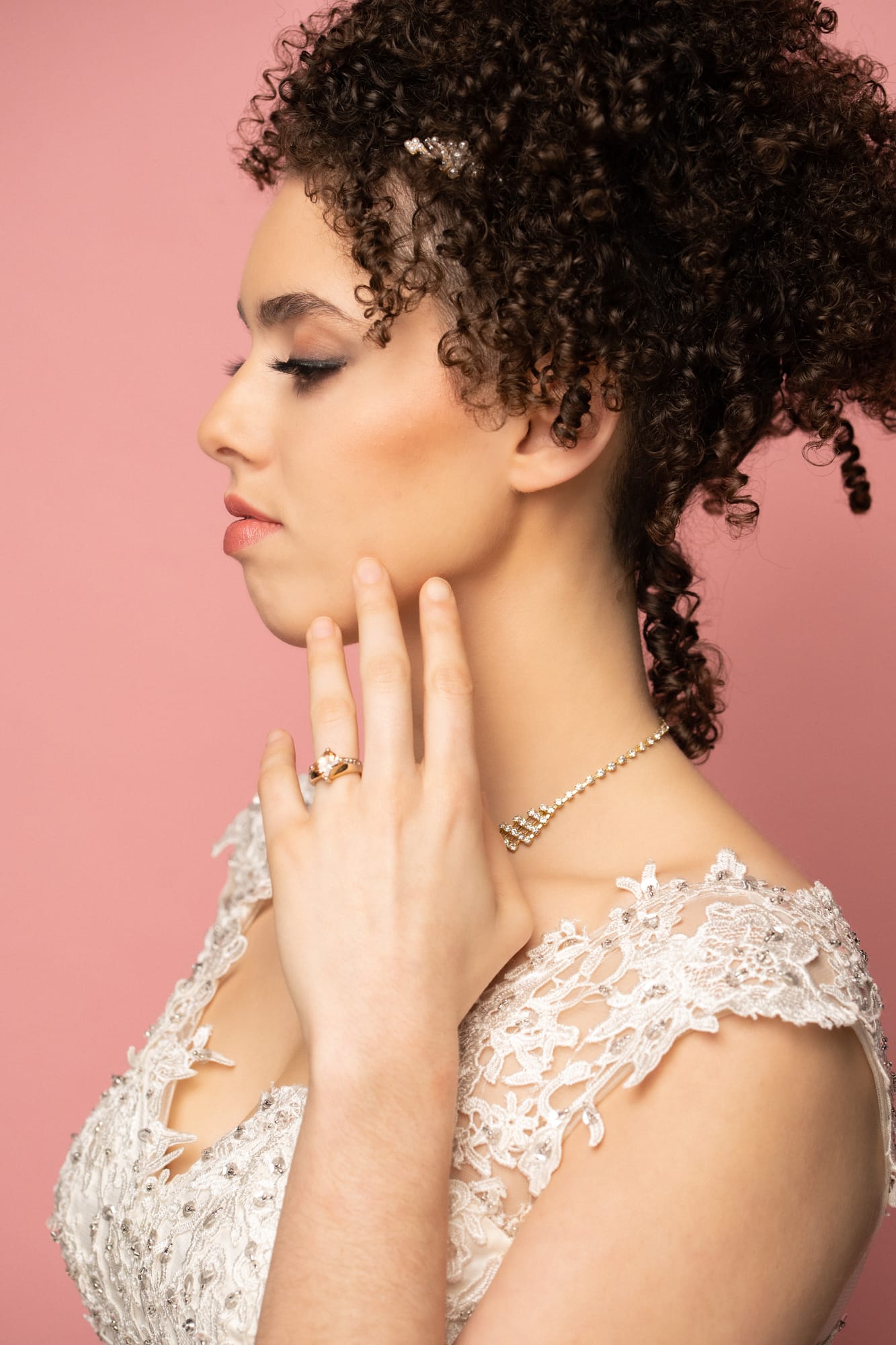 The Barbershoppe / Diva Den Bridal Formals corporate story frame 3: Collaborative bridal-formal brand photography for The Barbershoppe and Diva Den Day Spa at Kelowna Film Studios, with hair, makeup, formal looks, studio portraits and campaign-ready beauty imagery..