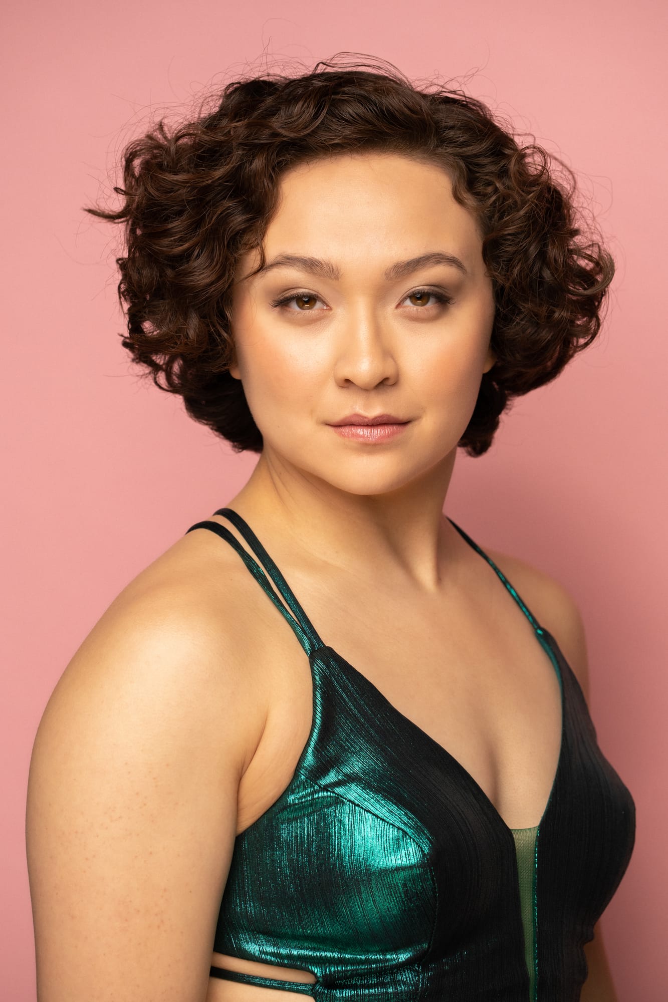 The Barbershoppe / Diva Den Bridal Formals corporate story frame 6: Collaborative bridal-formal brand photography for The Barbershoppe and Diva Den Day Spa at Kelowna Film Studios, with hair, makeup, formal looks, studio portraits and campaign-ready beauty imagery..
