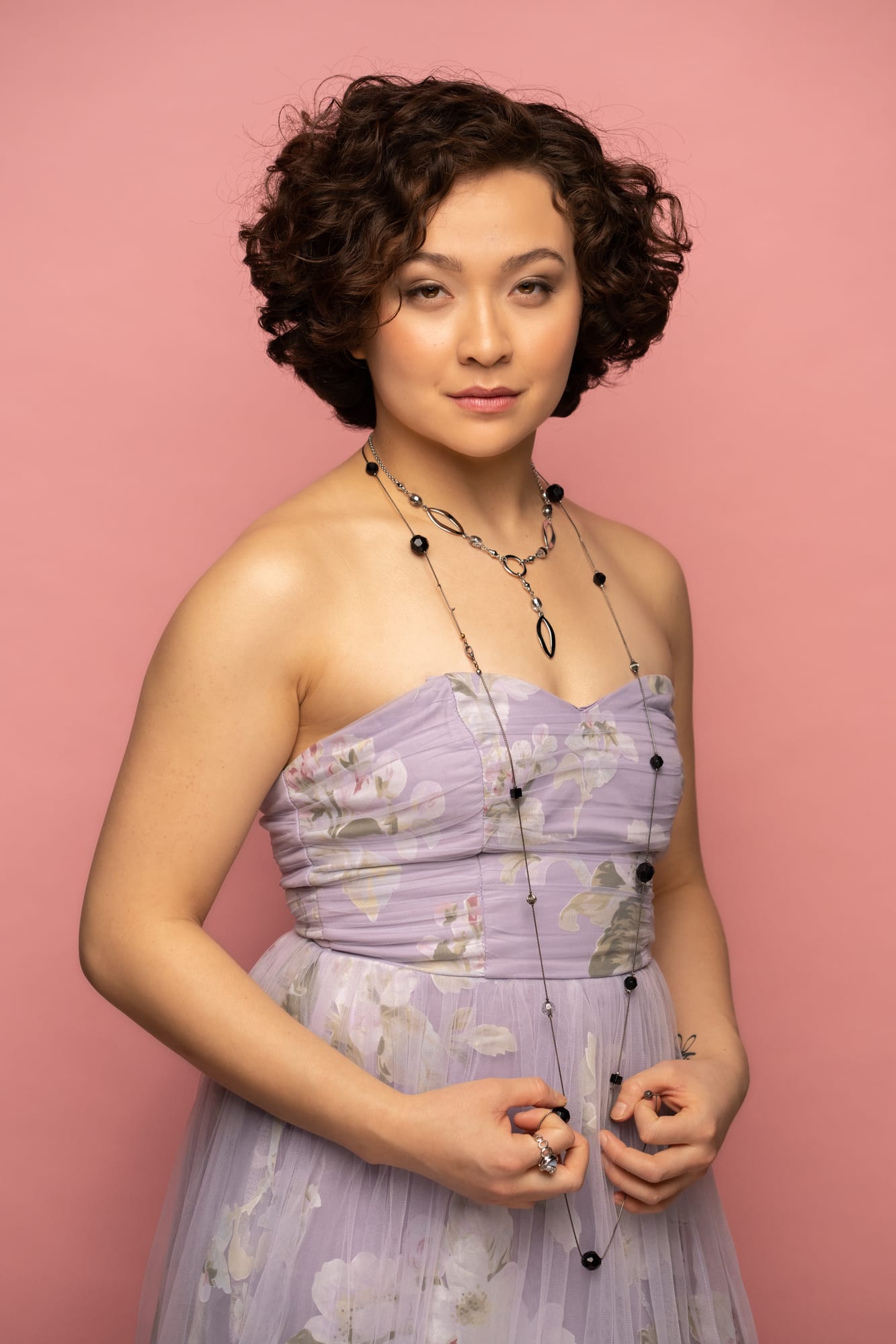 The Barbershoppe / Diva Den Bridal Formals corporate story frame 19: Collaborative bridal-formal brand photography for The Barbershoppe and Diva Den Day Spa at Kelowna Film Studios, with hair, makeup, formal looks, studio portraits and campaign-ready beauty imagery..