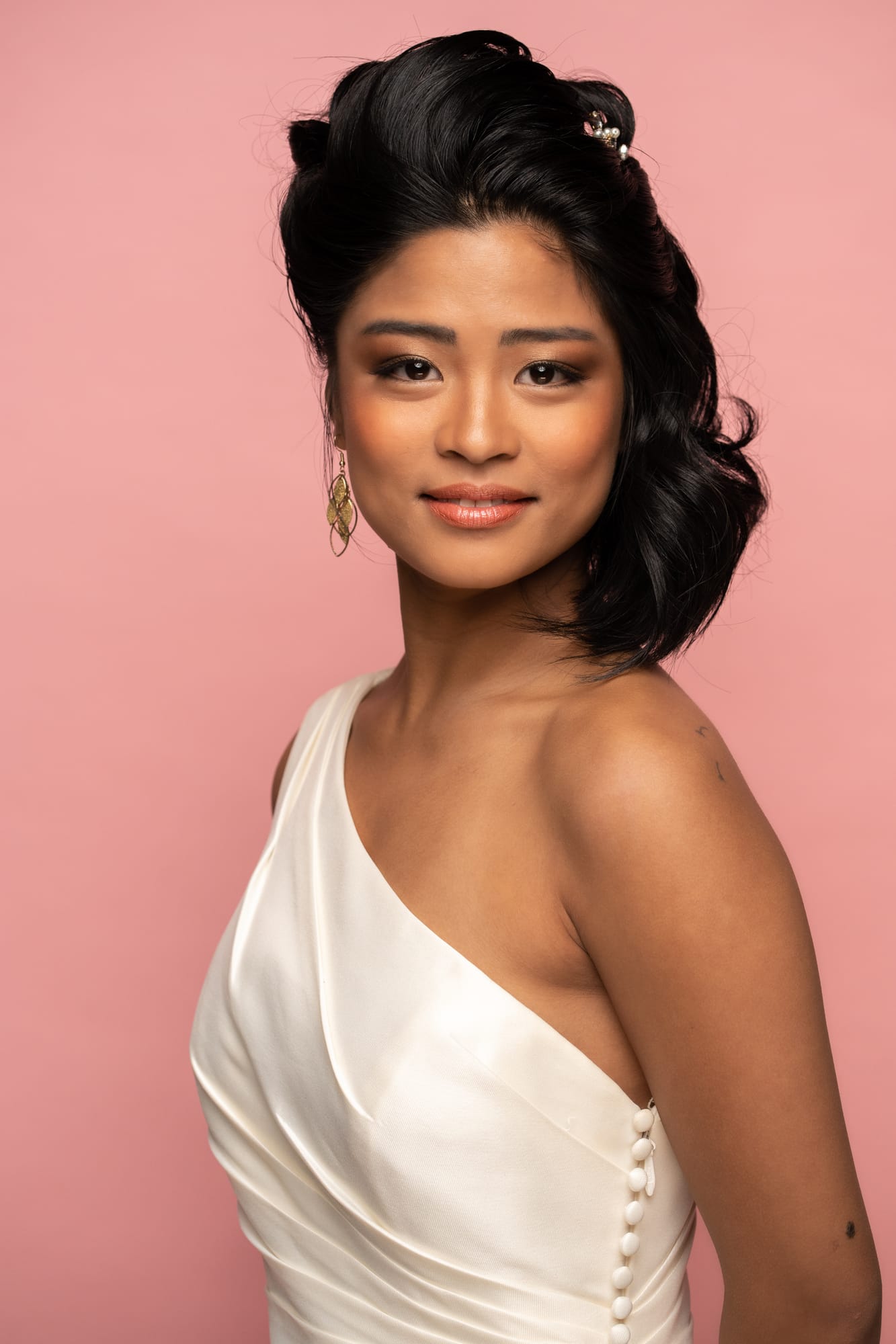 The Barbershoppe / Diva Den Bridal Formals corporate story frame 28: Collaborative bridal-formal brand photography for The Barbershoppe and Diva Den Day Spa at Kelowna Film Studios, with hair, makeup, formal looks, studio portraits and campaign-ready beauty imagery..