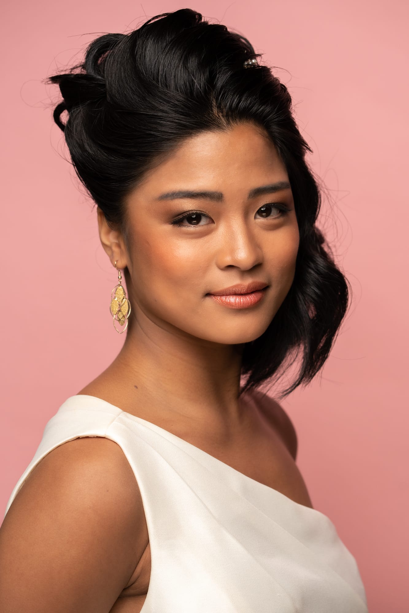 The Barbershoppe / Diva Den Bridal Formals corporate story frame 29: Collaborative bridal-formal brand photography for The Barbershoppe and Diva Den Day Spa at Kelowna Film Studios, with hair, makeup, formal looks, studio portraits and campaign-ready beauty imagery..