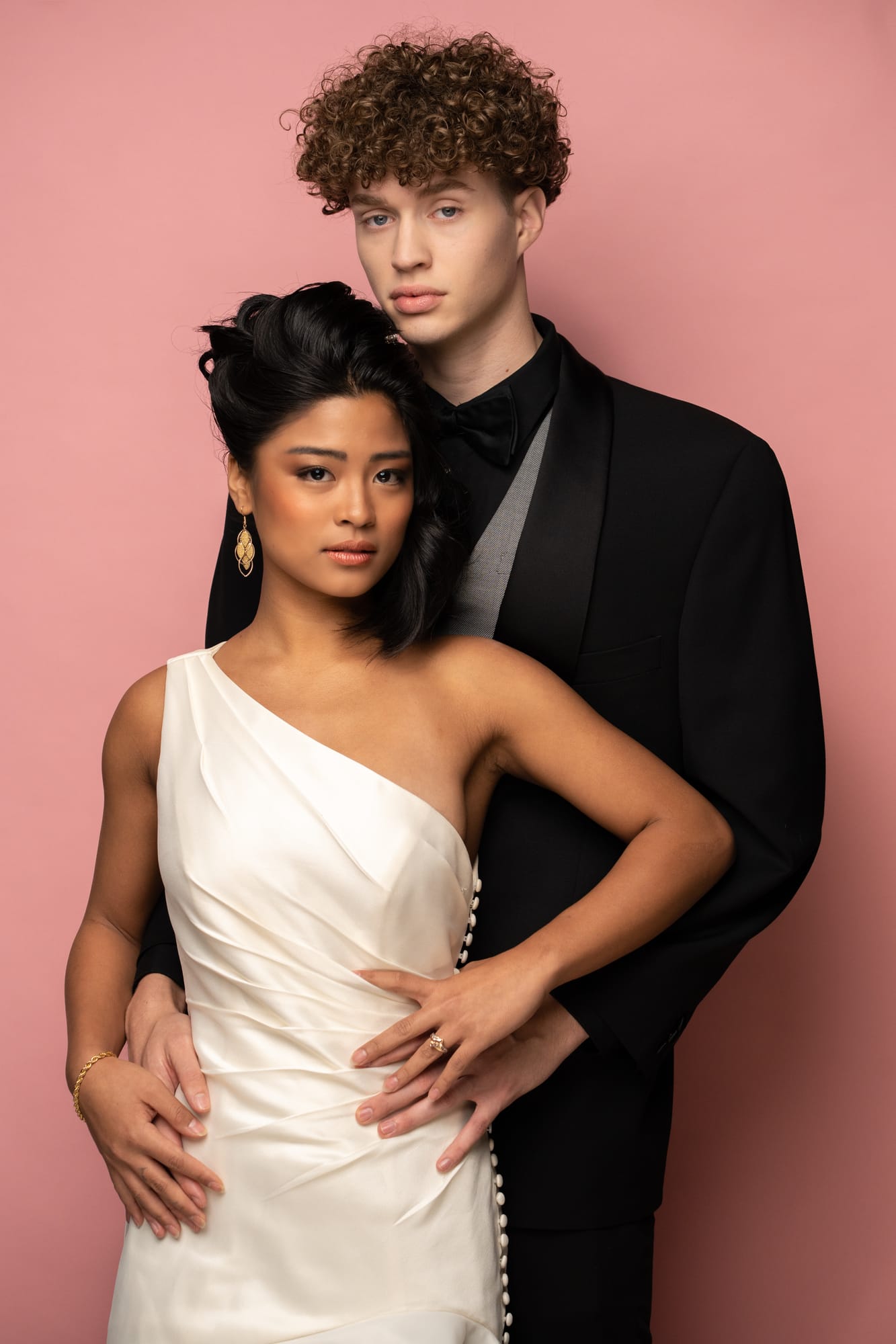 The Barbershoppe / Diva Den Bridal Formals corporate story frame 30: Collaborative bridal-formal brand photography for The Barbershoppe and Diva Den Day Spa at Kelowna Film Studios, with hair, makeup, formal looks, studio portraits and campaign-ready beauty imagery..