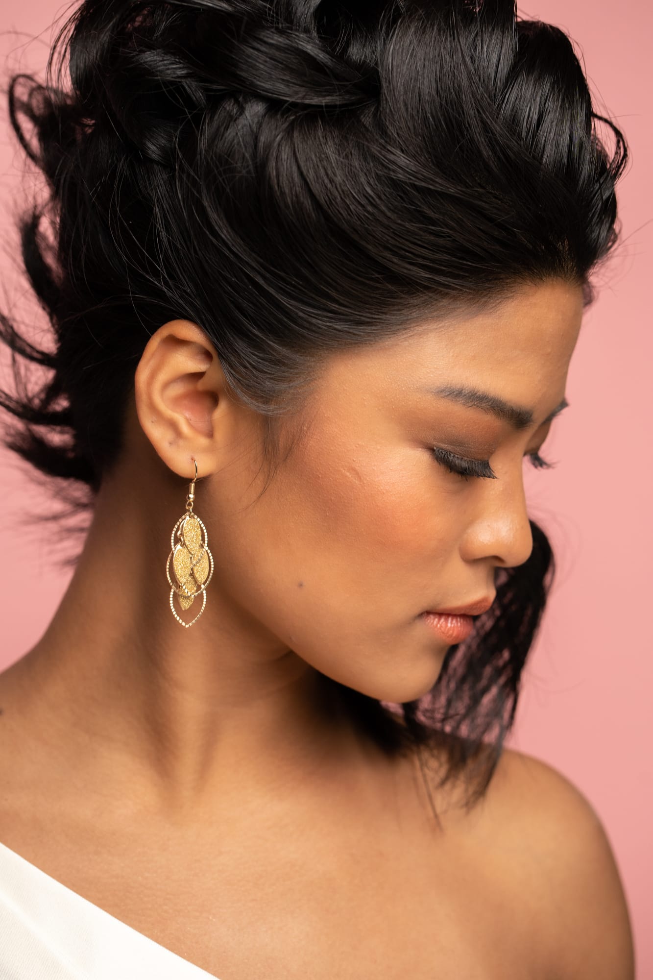 The Barbershoppe / Diva Den Bridal Formals corporate story frame 32: Collaborative bridal-formal brand photography for The Barbershoppe and Diva Den Day Spa at Kelowna Film Studios, with hair, makeup, formal looks, studio portraits and campaign-ready beauty imagery..