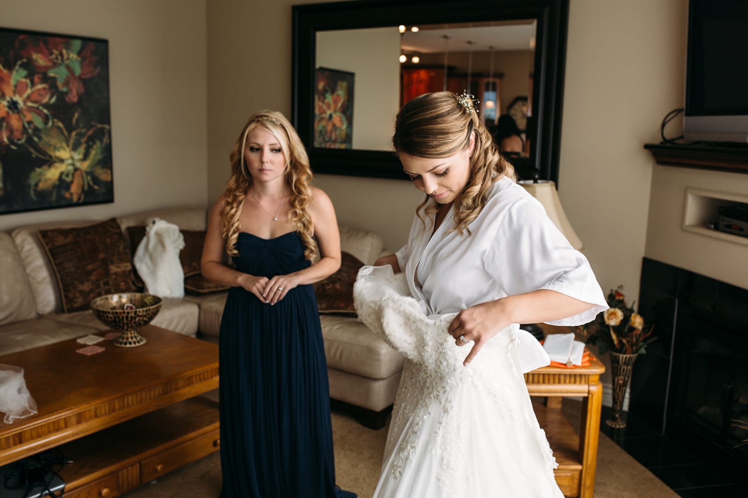 Tia and Matt weddings story frame 6: A Mabel Lake Airpark wedding in the North Okanagan, with grass-runway scenery, mountain openness and a warm end-of-night invitation..