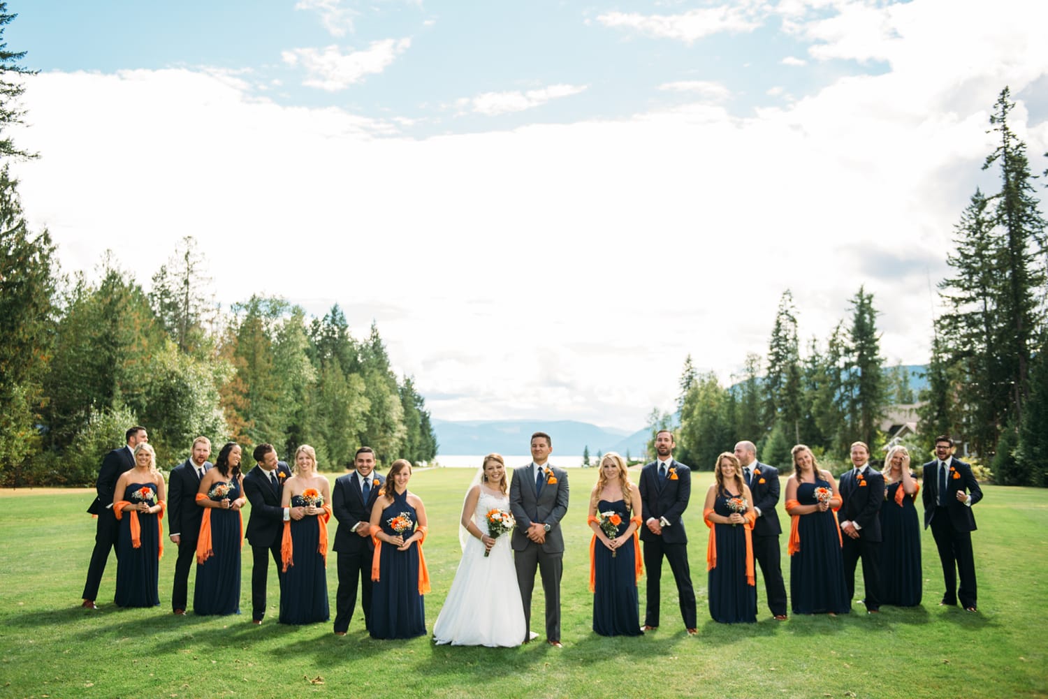 Tia and Matt weddings story frame 17: A Mabel Lake Airpark wedding in the North Okanagan, with grass-runway scenery, mountain openness and a warm end-of-night invitation..