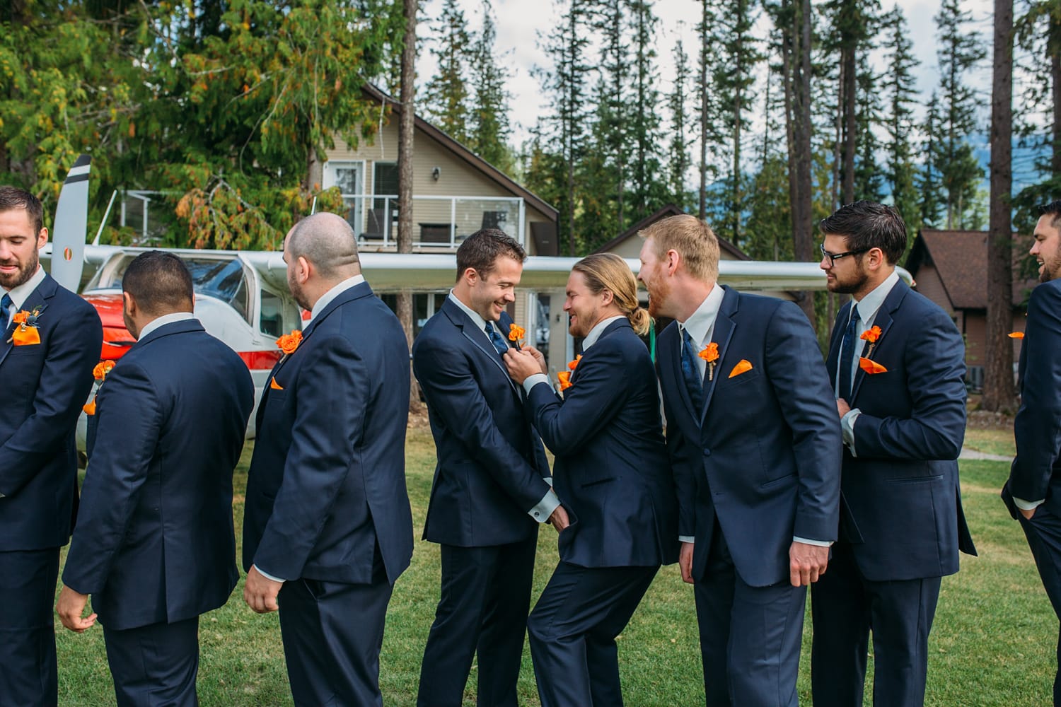 Tia and Matt weddings story frame 18: A Mabel Lake Airpark wedding in the North Okanagan, with grass-runway scenery, mountain openness and a warm end-of-night invitation..