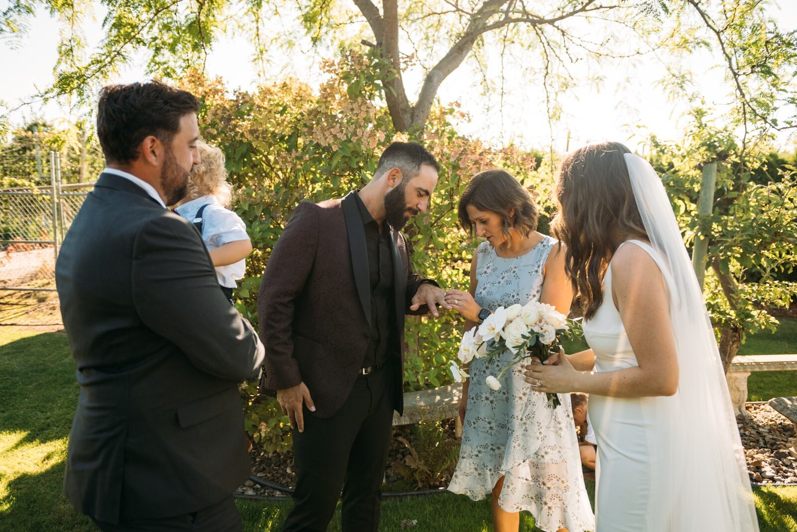 Vanessa and Sep weddings story frame 2: A Kelowna wedding moving from A Touch of English to Belgo Wedding Chapel, Scenic Canyon Park portraits, and a Bernie's Supper Club reception..