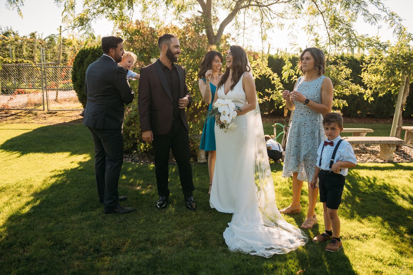 Vanessa and Sep weddings story frame 4: A Kelowna wedding moving from A Touch of English to Belgo Wedding Chapel, Scenic Canyon Park portraits, and a Bernie's Supper Club reception..