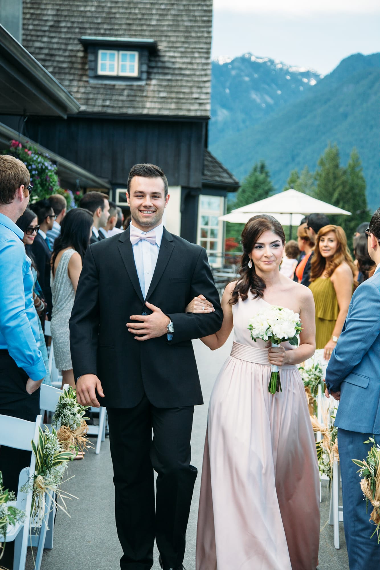 Vesta and Chris weddings story frame 18: A West Vancouver wedding at Capilano Golf and Country Club, with Iranian and Scottish family details, formal club atmosphere, dresses and kilts..